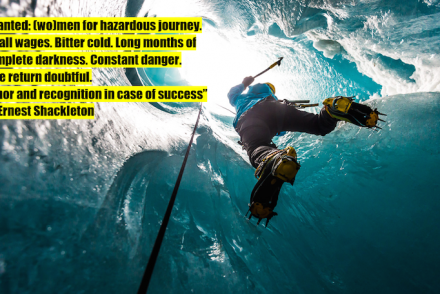 person ice climbing