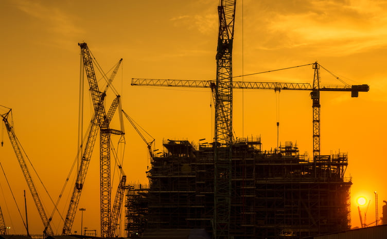 Silhouette of construction activities.