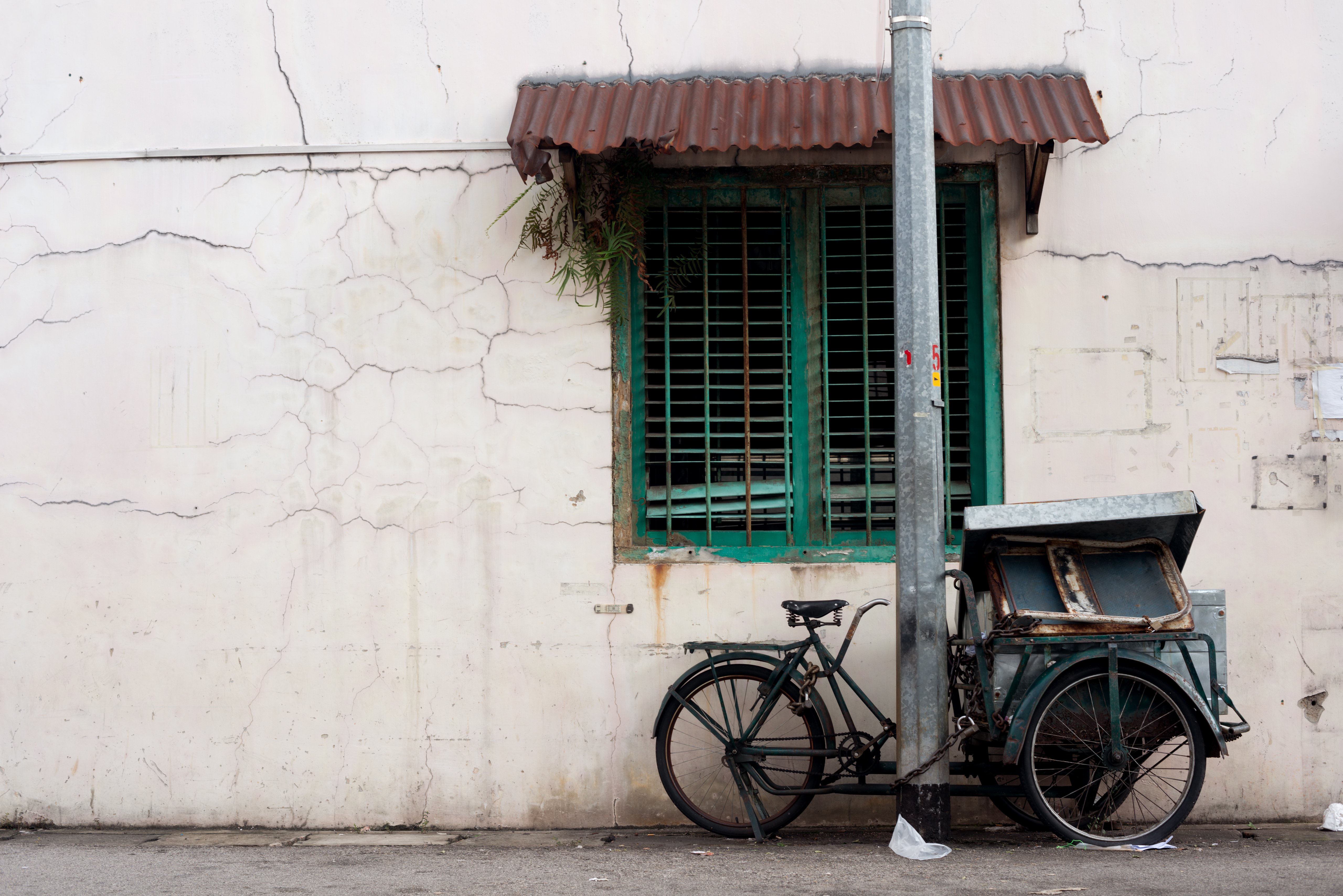 Old singaporean building with bike outside