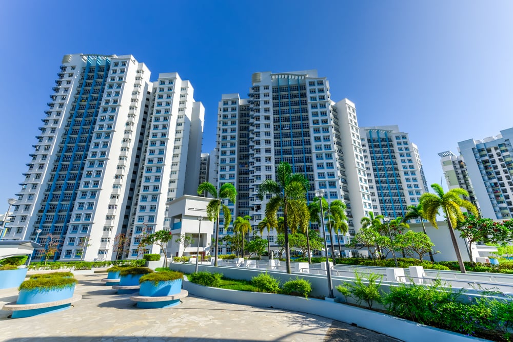 view of a condo from the swimming pool level