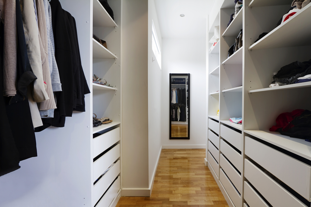 walk in wardrobe with mirror and shelves