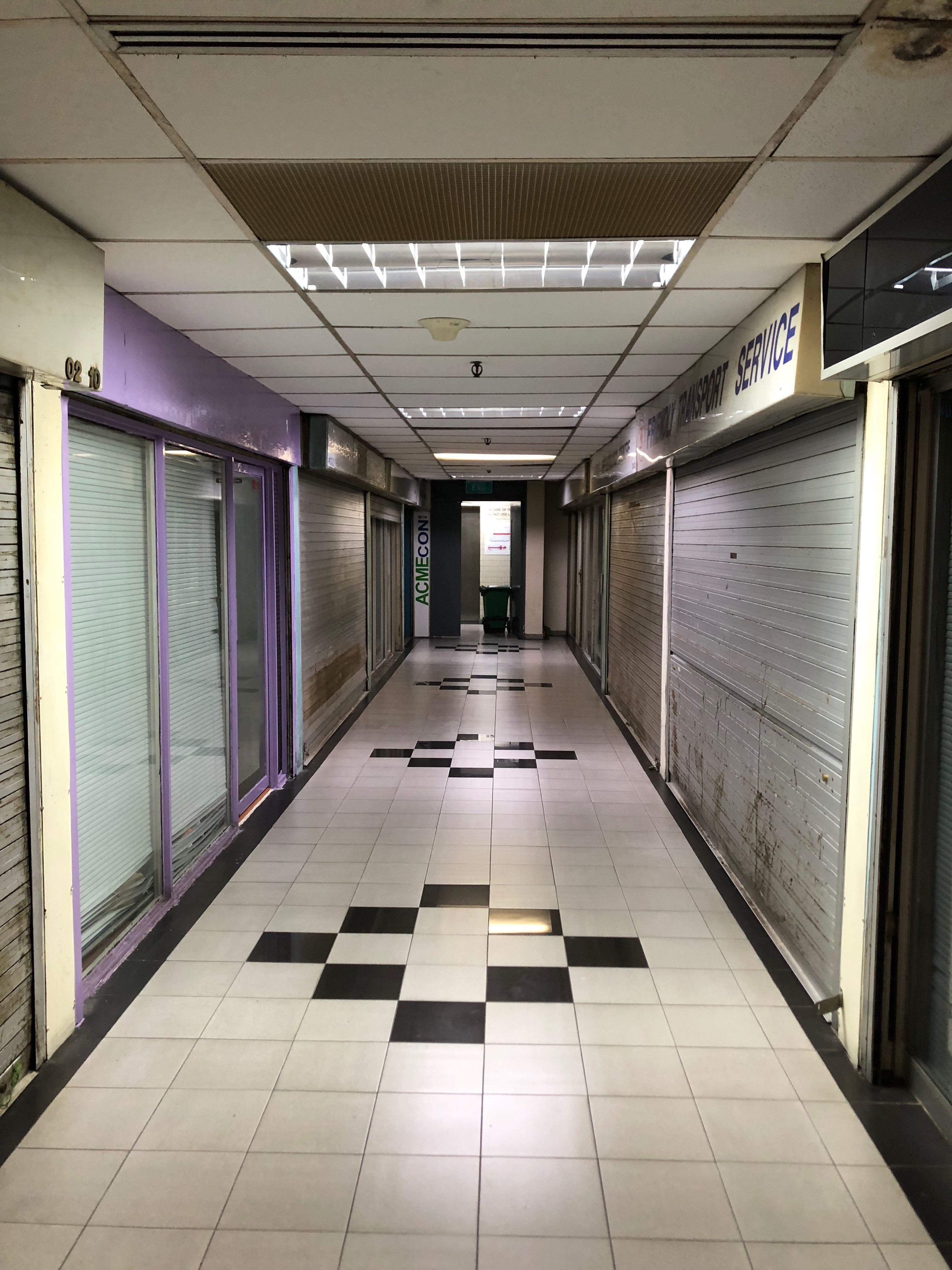 Empty shop units in Ming Arcade.