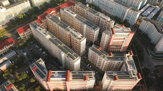 Solar panels installed on the rooftops of HDB blocks