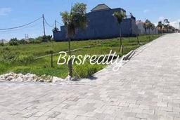 Tanah 7are harga 650jt/are Super Strategis,Bagus Aspek Perumahan,Lingkungan villa dan resto, view sawah