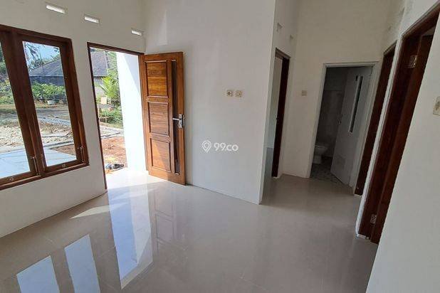 RUMAH PALING BARU 5 MENIT DARI JALAN RAYA NASIONAL DI PUTAT TANPA DP