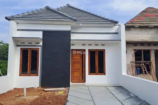 RUMAH PALING BARU 5 MENIT DARI JALAN RAYA NASIONAL DI PUTAT TANPA DP