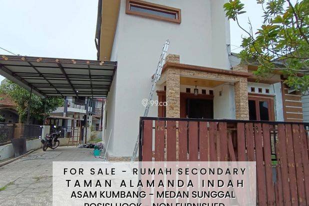 RUMAH CANTIK DI KOMPLEK TAMAN ALAMANDA INDAH - MEDAN