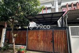 Rumah Berkualitas dengan Luas Tanah 105m2m² di Kawasan Elite , Surabaya Rumah Berkualitas dengan Luas Tanah 105m2m² di Kawasan Elite , Surabaya