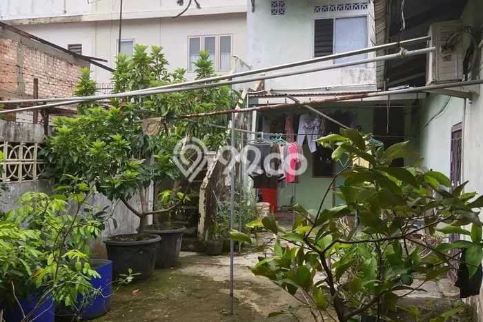 Rumah Modern 8 KT LT 300m2 di Lima Puluh Rumah Modern 8 KT LT 300m2 di Lima Puluh