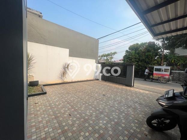 Rumah Elit LB 175m2 Siap Huni Desain Elegan di Jatiwaringin, Jakarta Timur Rumah Elit LB 175m2 Siap Huni Desain Elegan di Jatiwaringin, Jakarta Timur
