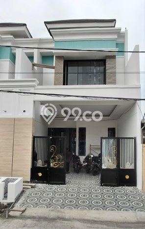 Rumah Elit Modern Tanpa Renovasi di Babatan Surabaya Rumah Elit Modern Tanpa Renovasi di Babatan Surabaya