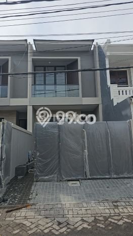 Rumah Elit Modern Tanpa Renovasi di Sutorejo Surabaya Rumah Elit Modern Tanpa Renovasi di Sutorejo Surabaya