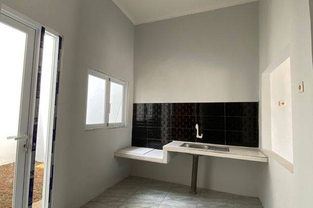 Rumah samping alfamart jl utama row jl lebar