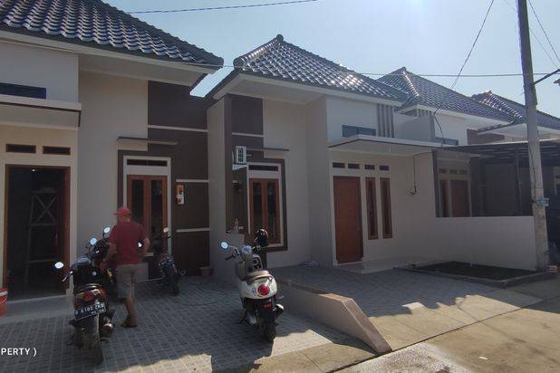 Di rumah cluster, dekat pintu tol sawangan,stasiun,lokasi strategis dan bebas banjir