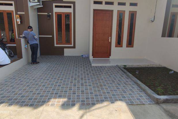 Di rumah cluster, dekat pintu tol sawangan,stasiun,lokasi strategis dan bebas banjir