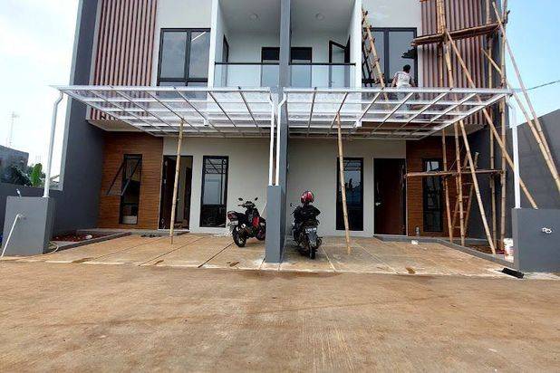 RUMAH CANTIK NYAMAN DEKAT PINTU TOL DESARI 2 CARPORT
