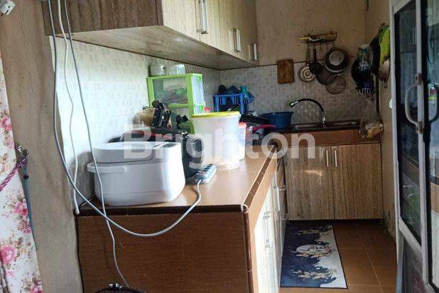 Hunian bernuansa biru dekat Rekreasi pantai batakan