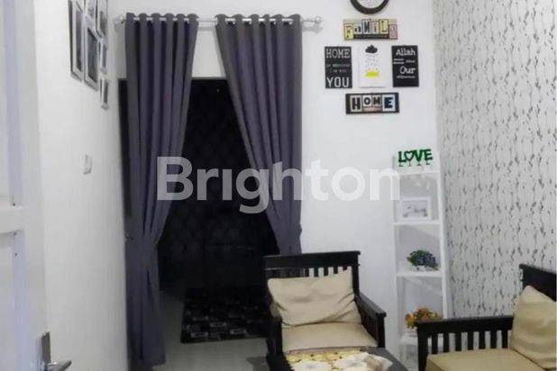 RUMAH MINIMALIS KAMPUNG TIMUR
