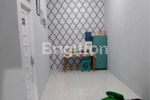 RUMAH MINIMALIS KAMPUNG TIMUR