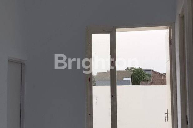 RUMAH BARU 200 JUTAAN DI PRAMBON-SIDOARJO, STRATEGIS DEKAT JALAN RAYA
