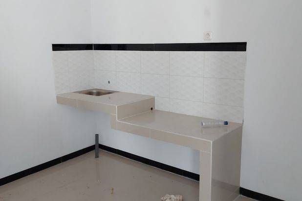 Rumah yang berlokasi di dataran tinggi  dengan segala kenyamanan selayaknya villa dan berada di kota malang