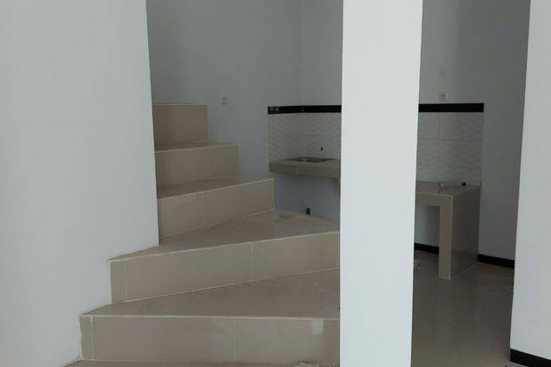 Rumah yang berlokasi di dataran tinggi  dengan segala kenyamanan selayaknya villa dan berada di kota malang