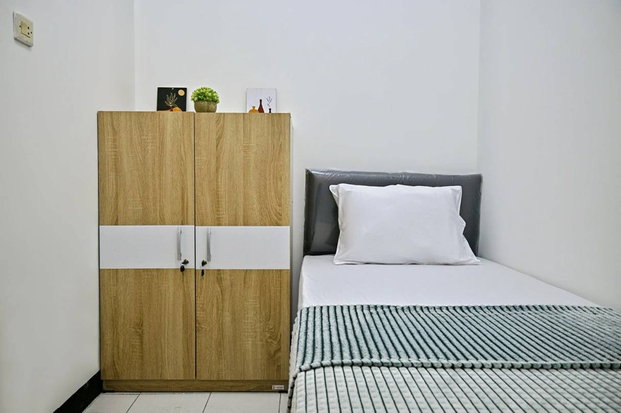 tempat tidur kost