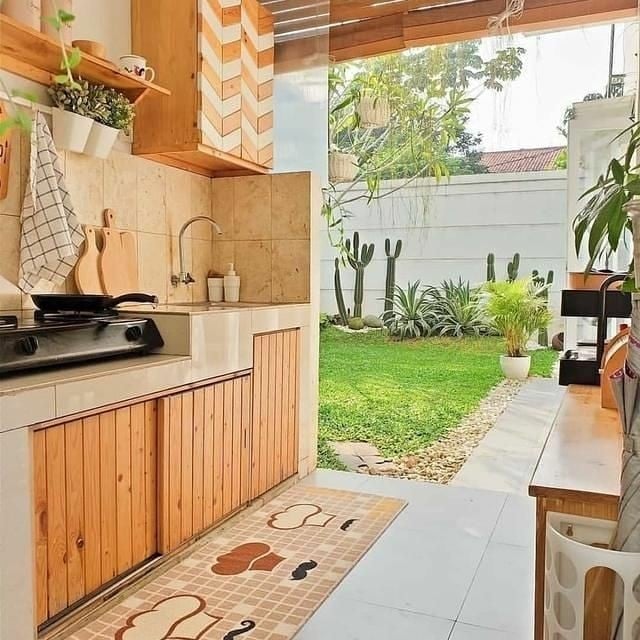 desain dapur rumah type 30/60 terbuka ke taman