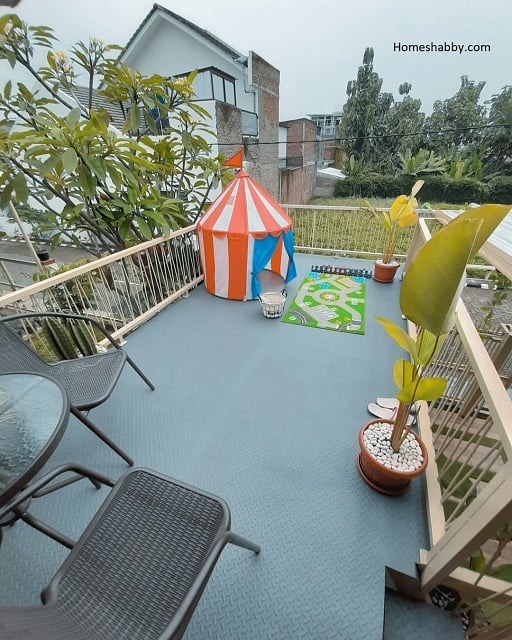 desain taman bermain anak di balkon rumah