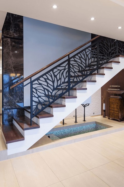 motif railing tangga besi sayap