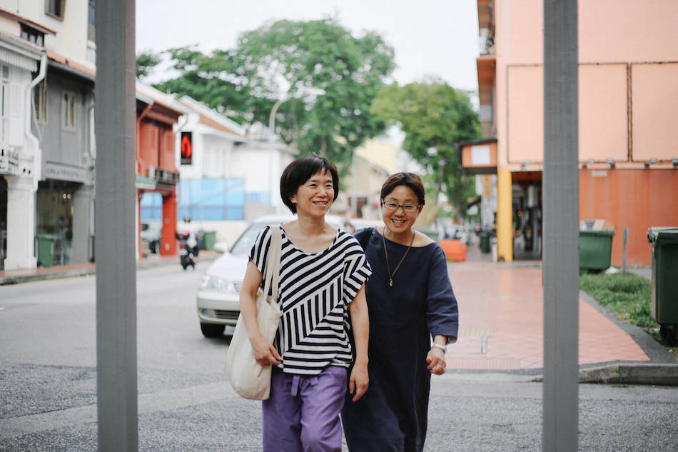 East Coast katong singapore women walking and smiling