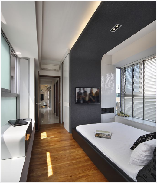 Whereas the living room is all about cartoon creations and colours, the master’s bedroom goes for a contemporary minimalist look. This area receives generous amount of natural light, courtesy of the wide glass windows
