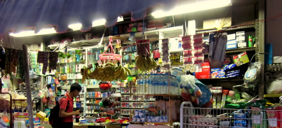 people in front of provision shop