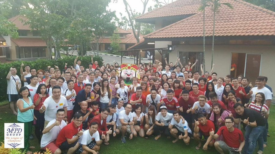 Mary Tan District Group having fun at a CNY retreat.