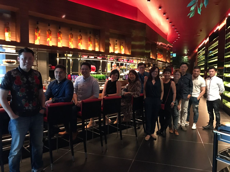 Lewis and his team leaders dining at a Michelin-starred restaurant in Bangkok