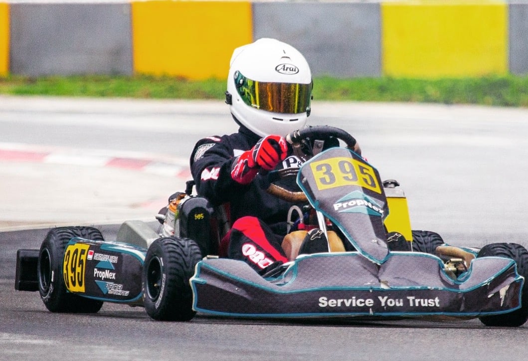 norman koh propnex car racing 