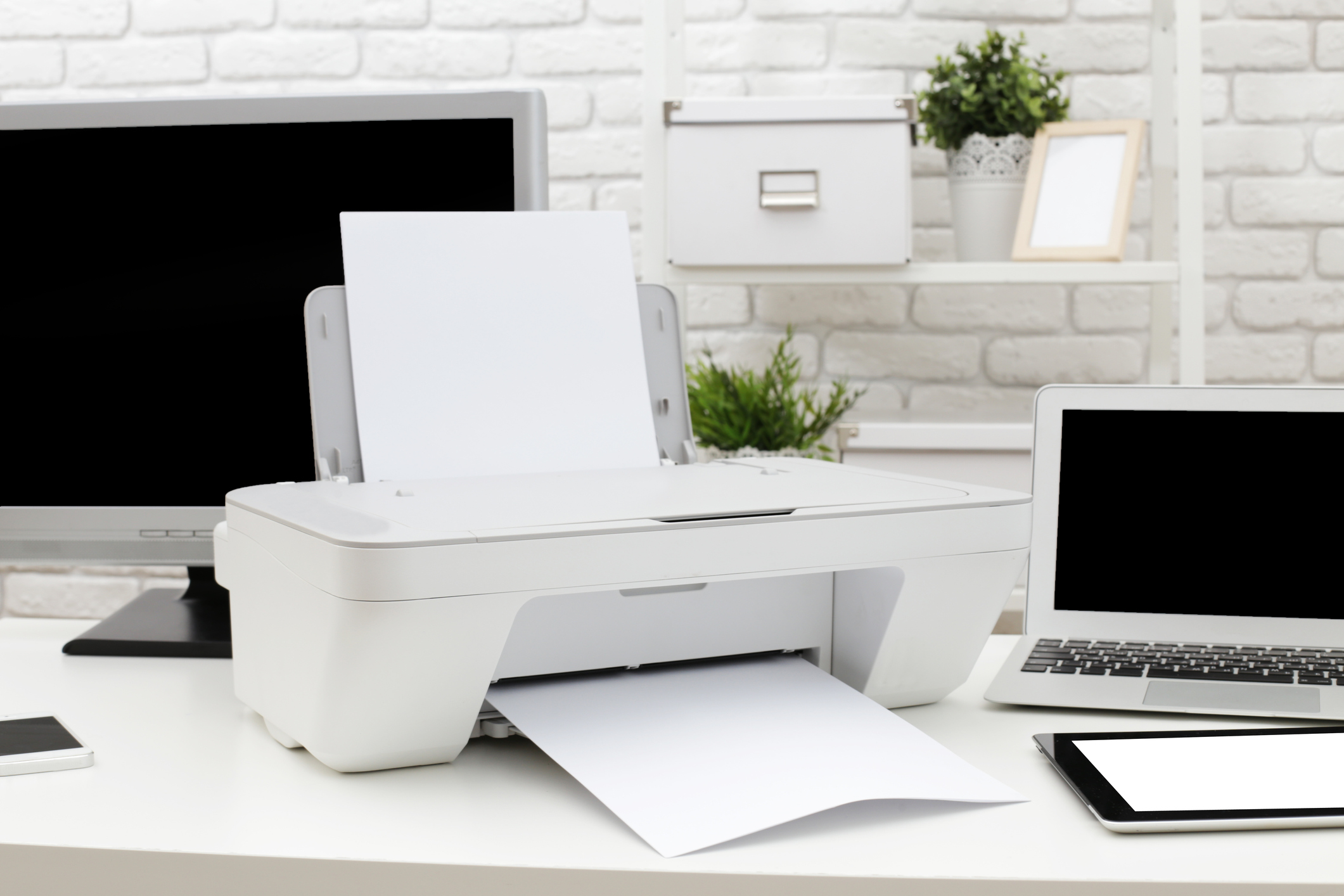 Printer and PC on a desk