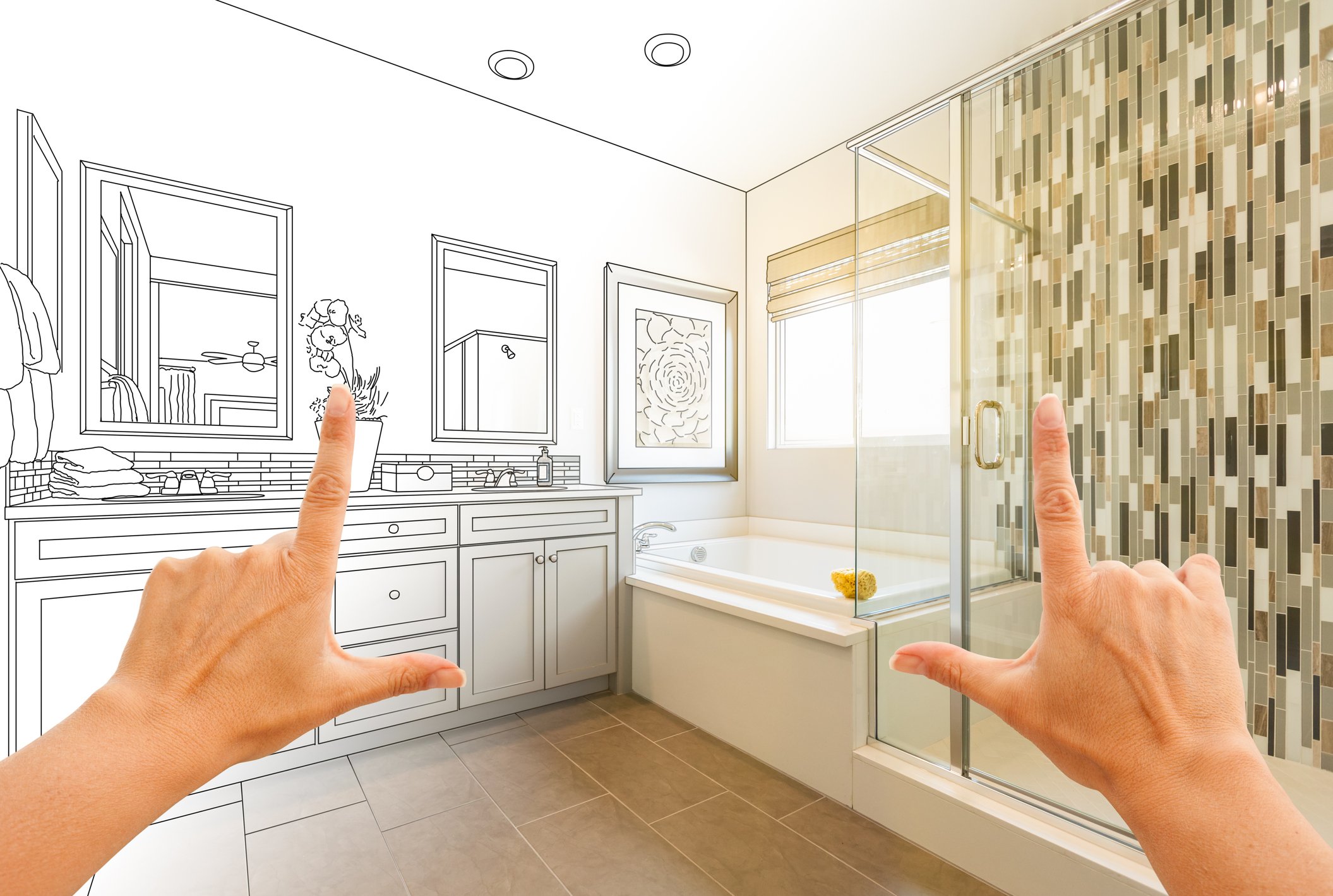 Person visualising renovations by framing their hands