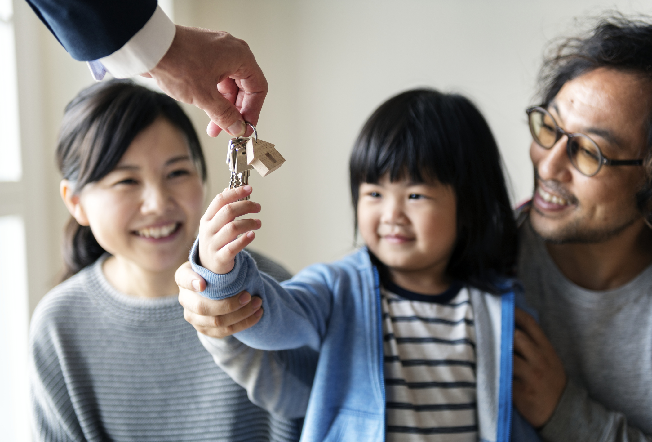 House keys handed to a child