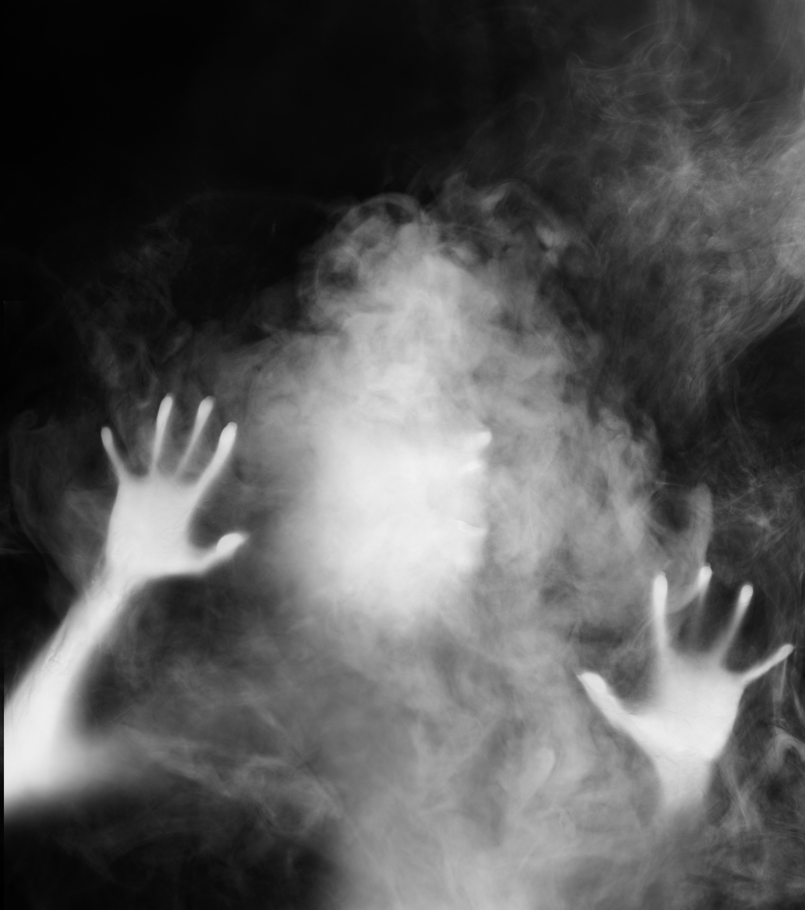 Ghostly figure with arms outstretched