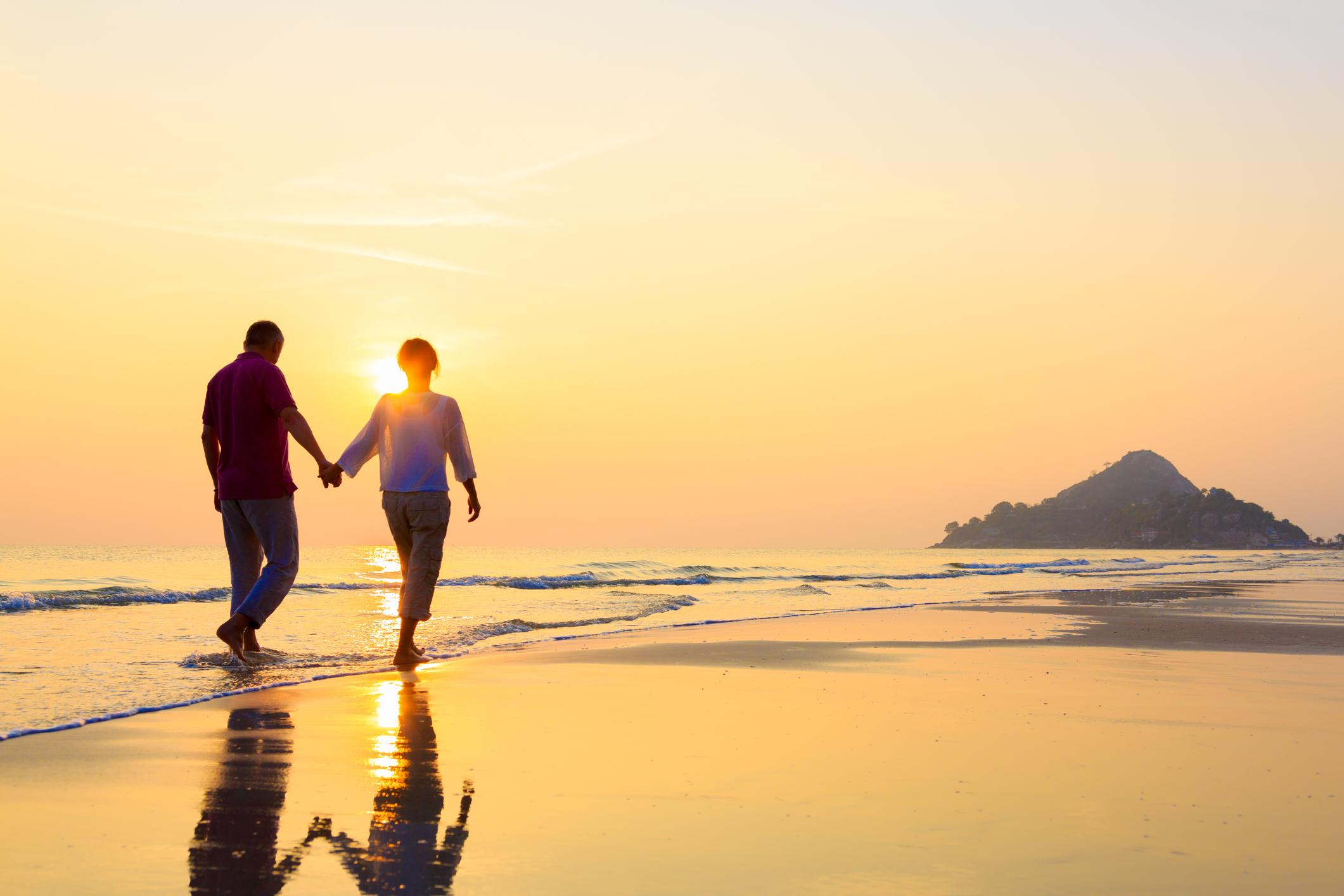 Senior couple at golden beach