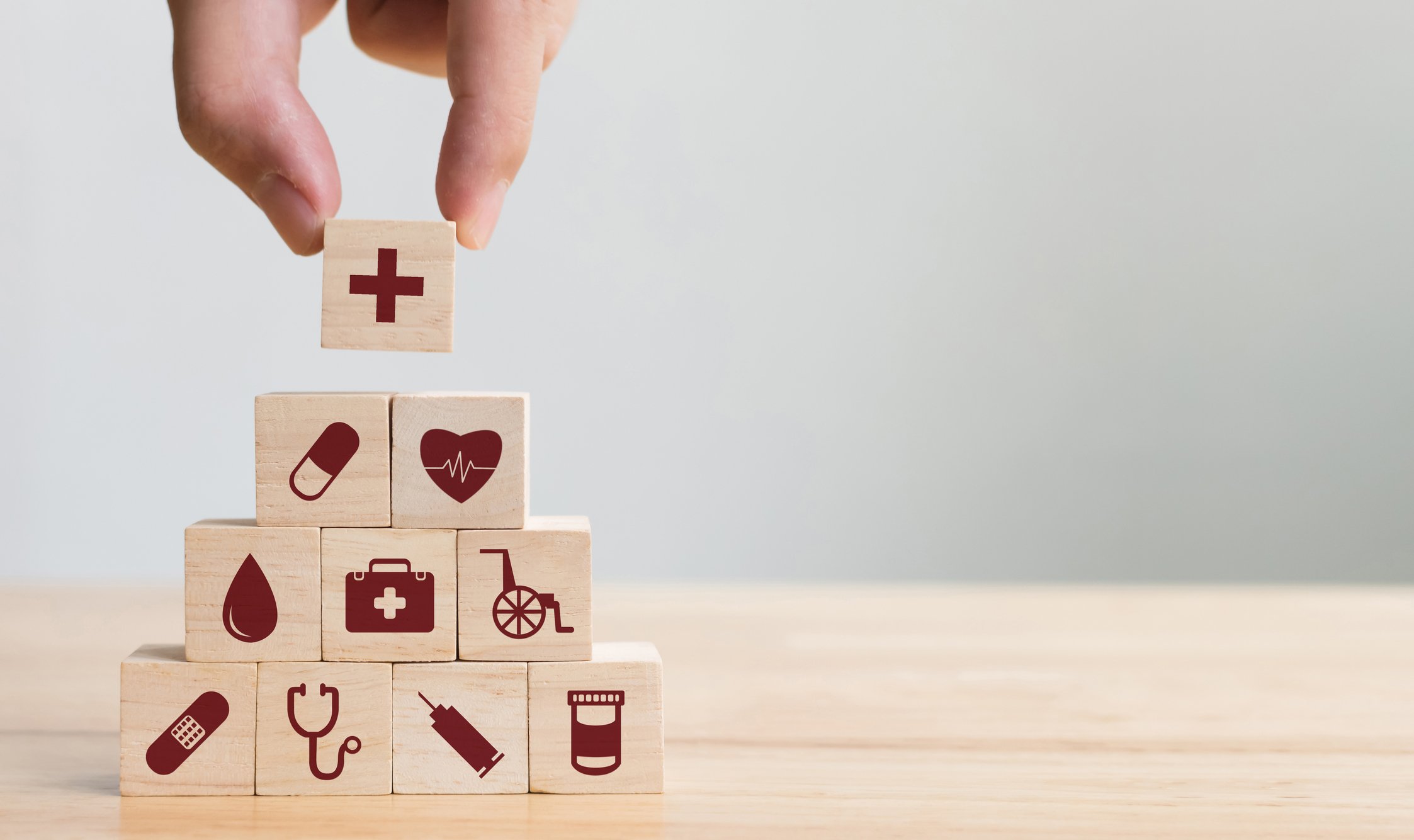 Wooden blocks showing eergency financial needs