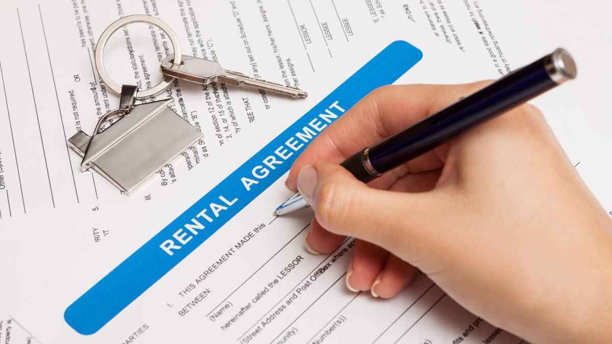 Person signing Rental Agreement form