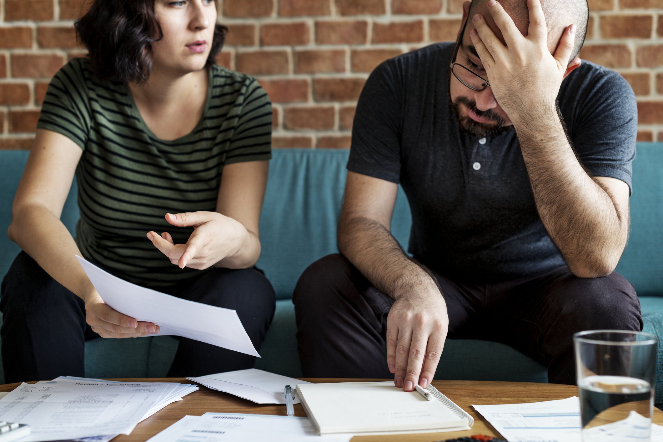 Two people arguing over some documents