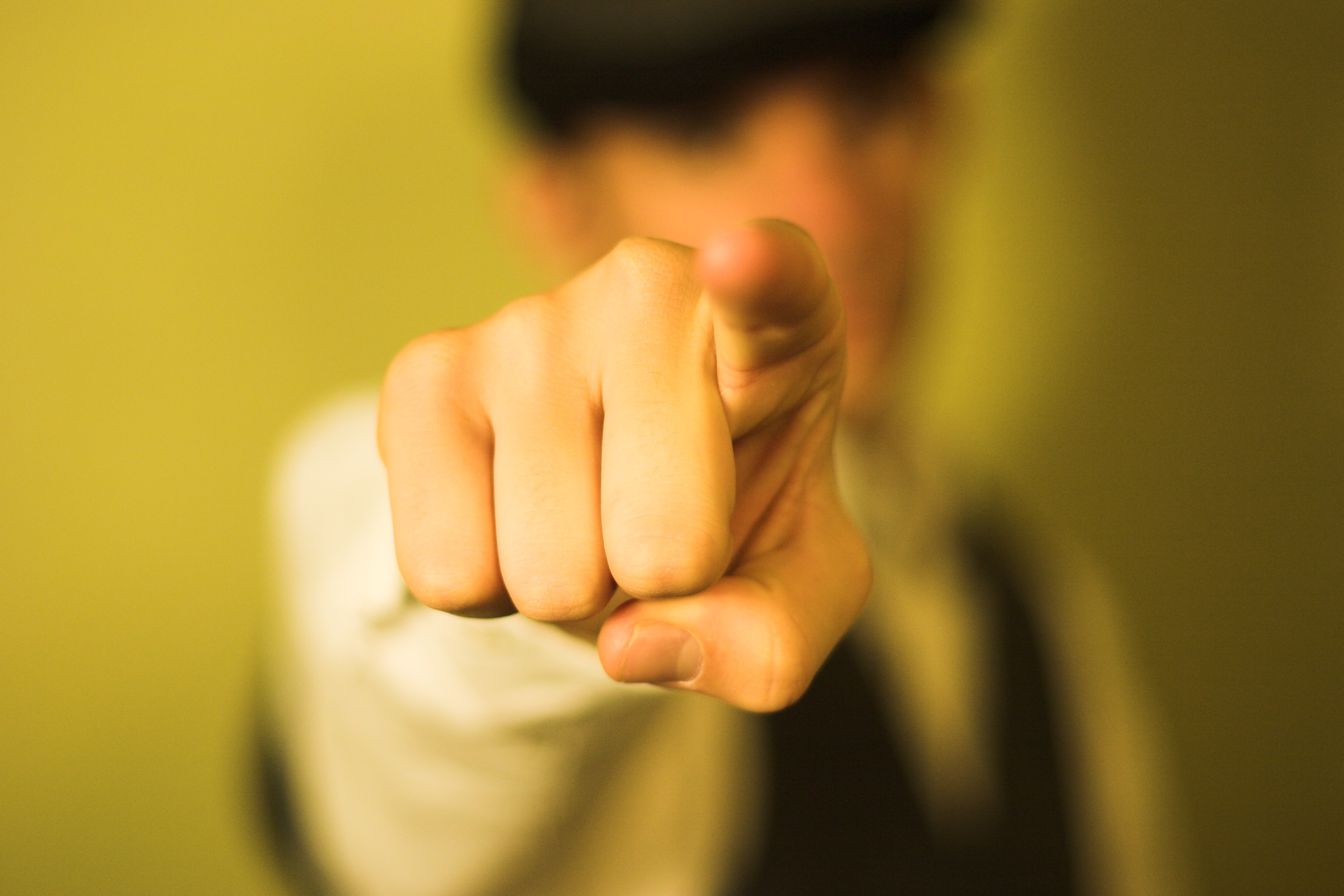 Man's hand pointing.