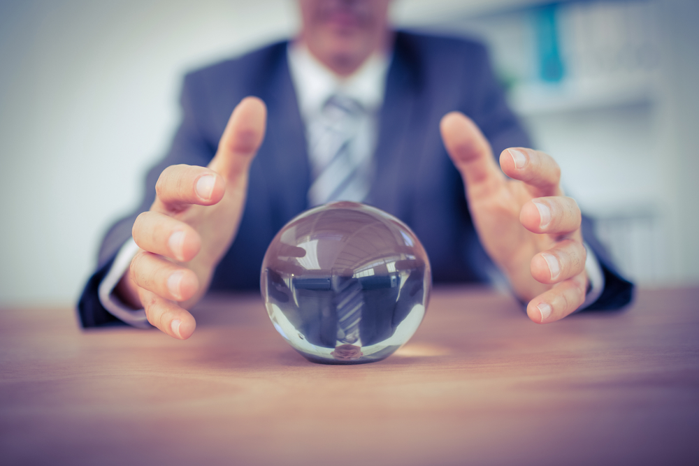 Business man with a crystal ball