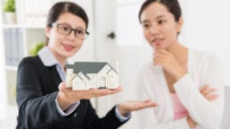 salesperson selling house