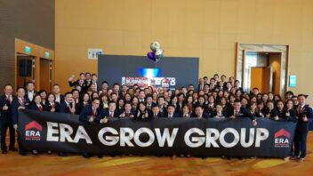 Roy Chong with ERA Grow Group banner and Affluent