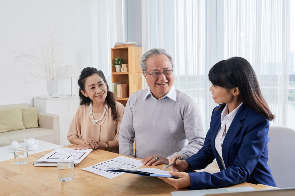 An elderly couple sat down to talk to their property agent