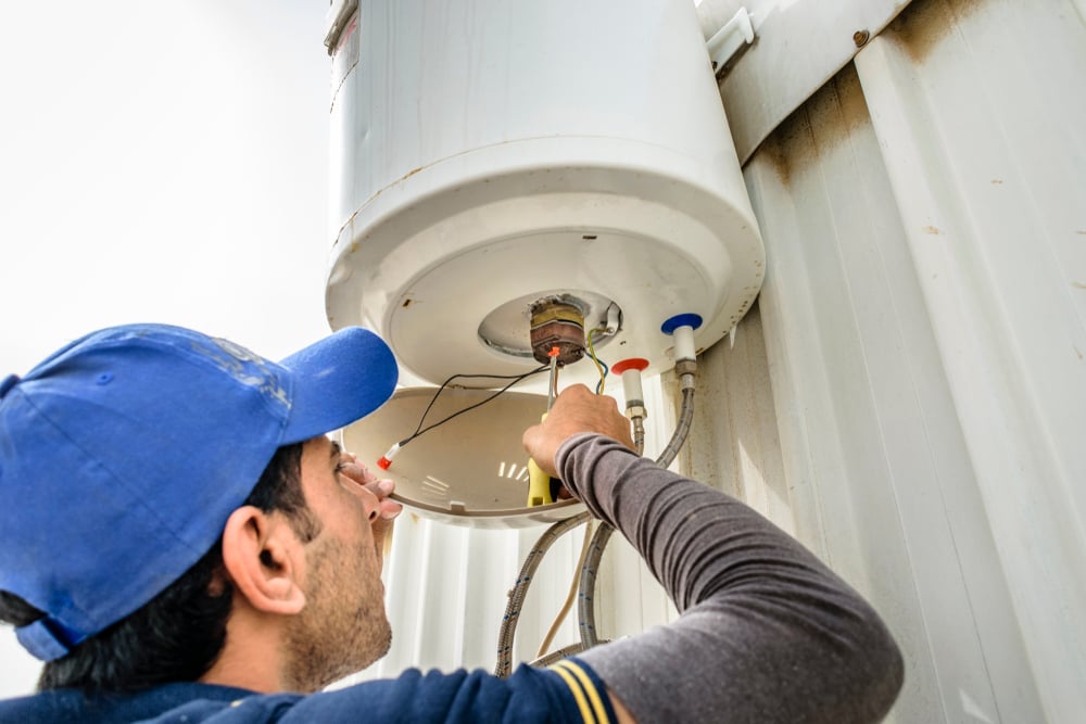 electrician-repairing-water-heater